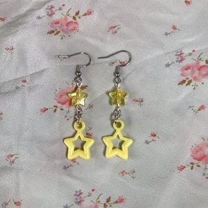 iridescent yellow star earrings